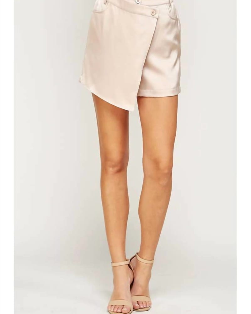 Front of a model wearing a size LARGE Satin Wrap Skort In Taupe in Taupe by Strut & Bolt. | dia_product_style_image_id:358449